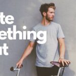Men In Grey T-shirt With Bicycle