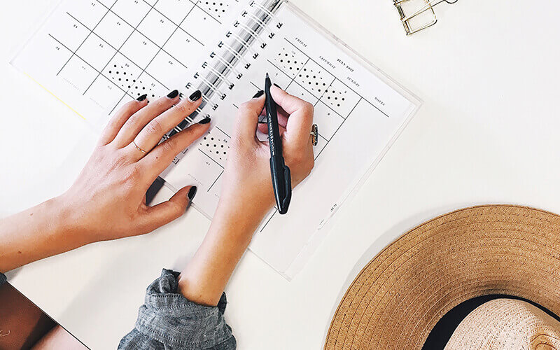 Planning With Notebook And Pen