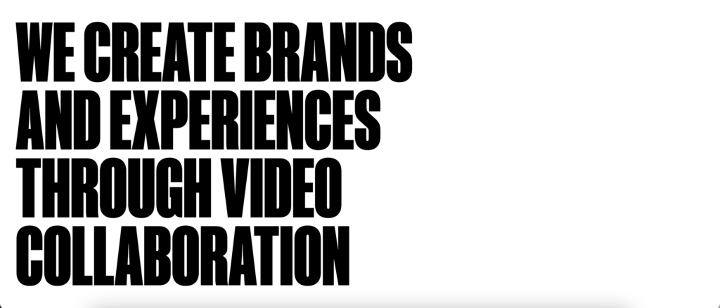 **Alt Text:** Bold black text on a white background reads, "WE CREATE BRANDS AND EXPERIENCES THROUGH VIDEO COLLABORATION."