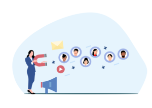 A businesswoman uses a magnet to attract icons of people and digital symbols like an envelope and play button, with a megaphone placed beside her.