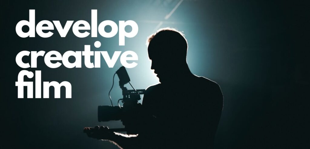 A silhouette of a person holding a camera with the words "develop creative film" in bold white letters.