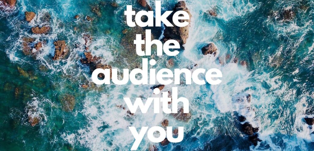 Aerial view of ocean waves crashing on rocks with the text "take the audience with you."