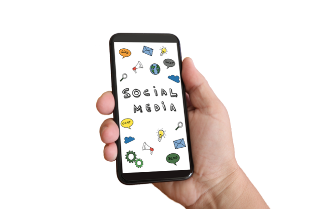A hand holding a smartphone displaying a screen with the words "Social Media" surrounded by various hand-drawn icons like chat bubbles, gears, and a globe.