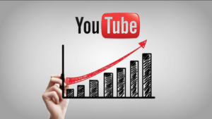 **Alt text:** A hand draws a bar graph with an upward trending red arrow, with the YouTube logo above.
