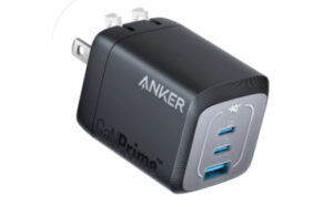 **Alt text:** A black Anker wall charger with two USB ports and a plug for electrical outlets.