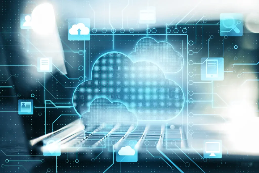 **Alt text:** A digital illustration of a cloud hovering over a laptop keyboard, surrounded by icons representing data and technology.