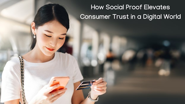 A woman looks at her phone while holding a credit card, with the text "How Social Proof Elevates Consumer Trust in a Digital World" displayed beside her.