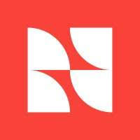 A geometric logo with four white quarter-circle shapes on a red background, forming a symmetrical design.