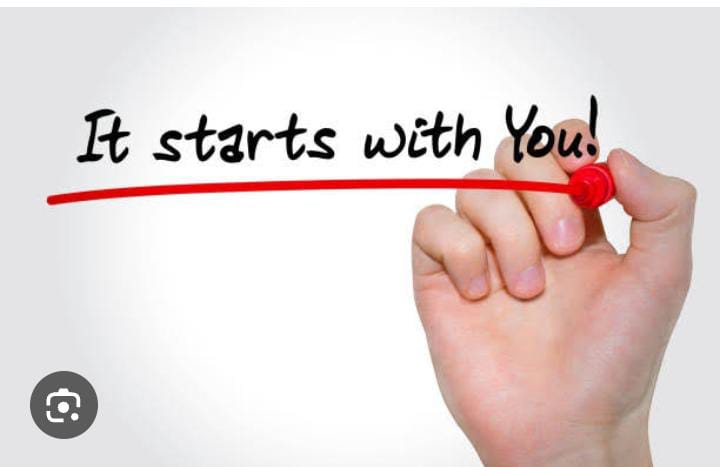 **Alt text:** A hand holding a red marker is underlining the words "It starts with you!" written in black text.