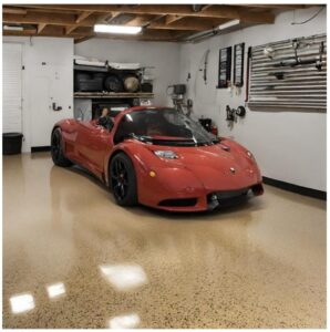 **Alt Text:** A red sports car is parked in a clean, organized garage with tools hanging on the wall and shelving units in the background.