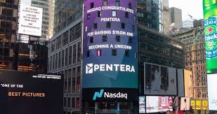 A Nasdaq billboard in a cityscape congratulates Pentera for raising $150M and becoming a unicorn.