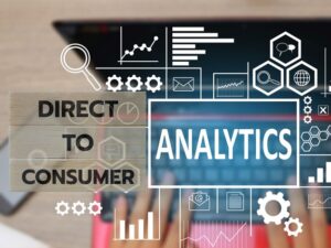 **Alt Text:** A digital illustration displaying the words "Direct to Consumer" and "Analytics" overlaid on a laptop, surrounded by various charts and graphs.